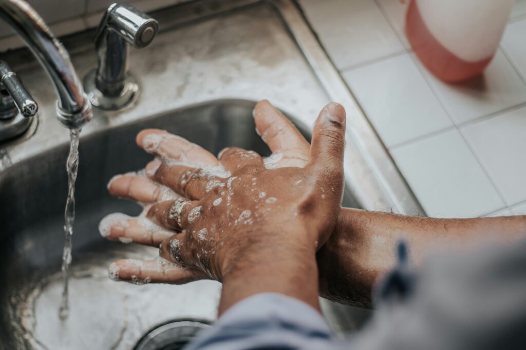 Image of someone washing their hands