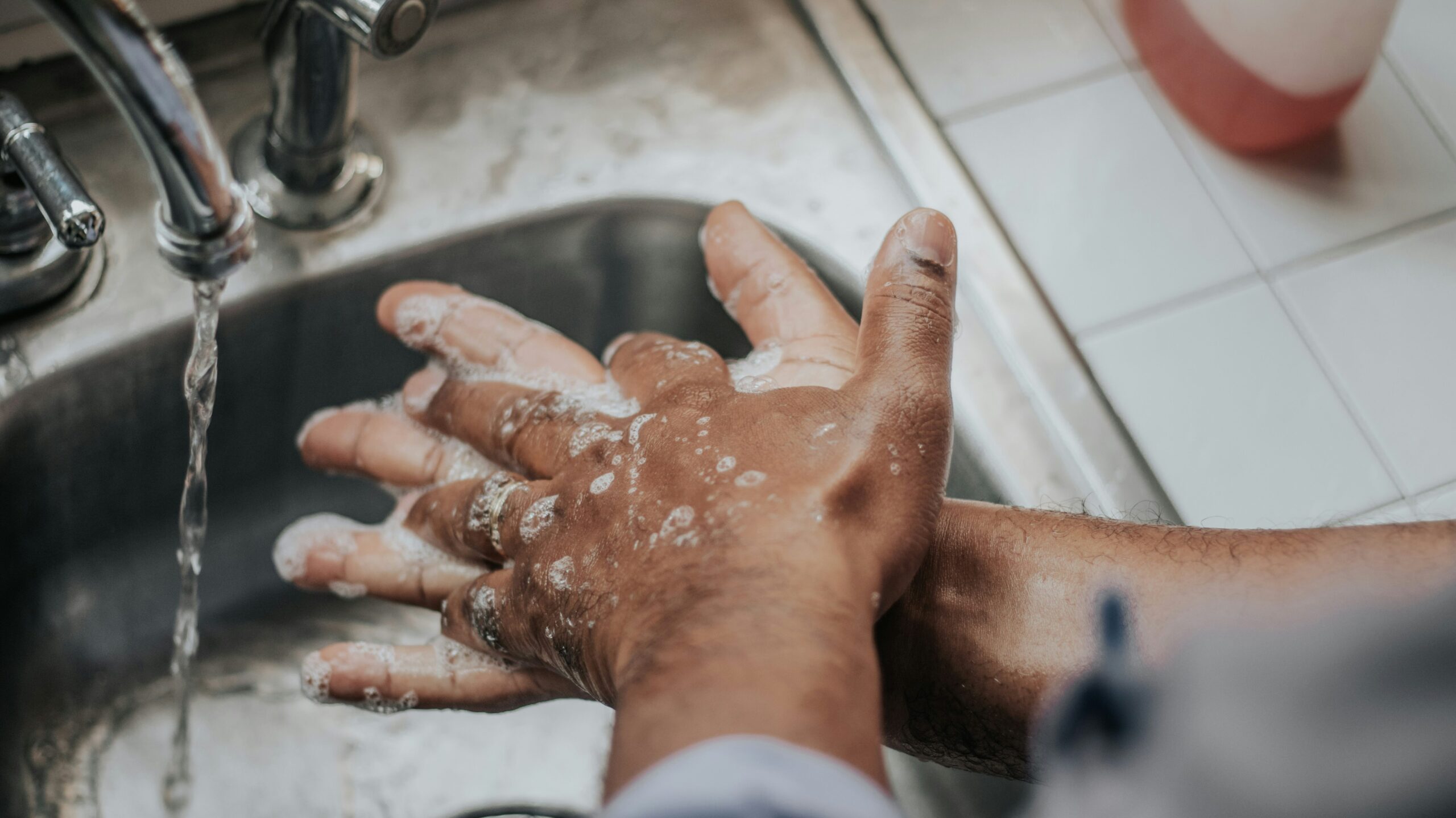 Image of someone washing their hands